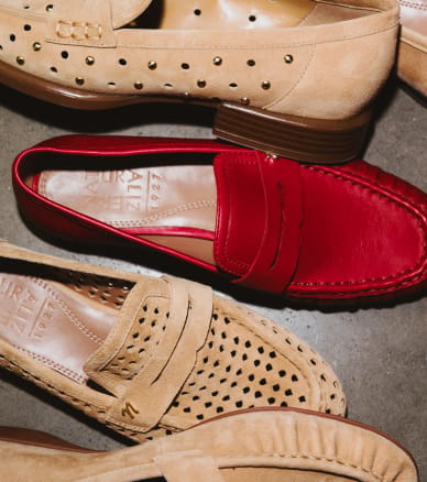 assortment of tan and red flats