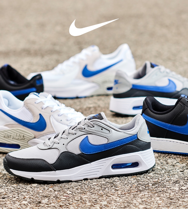 Assortment of white, blue and black Nike sneakers