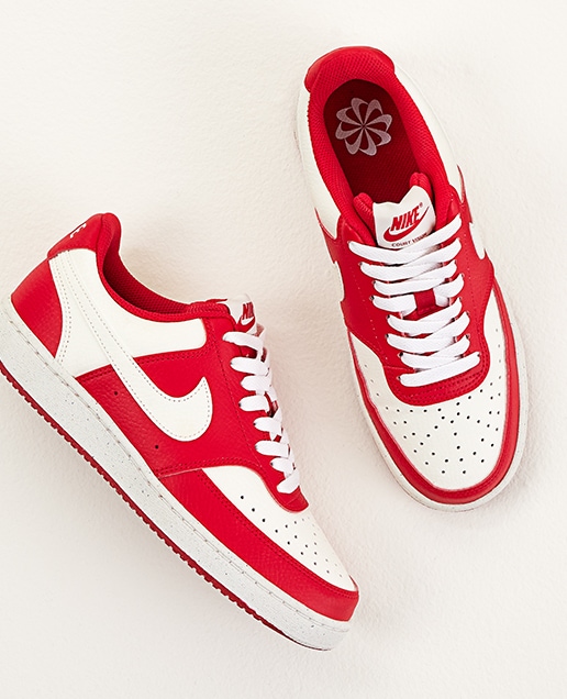 red and white nike court sneakers