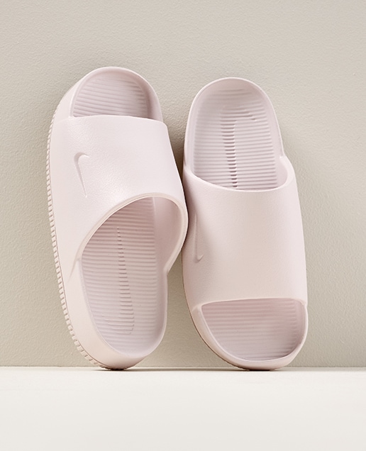 light pink nike slides
