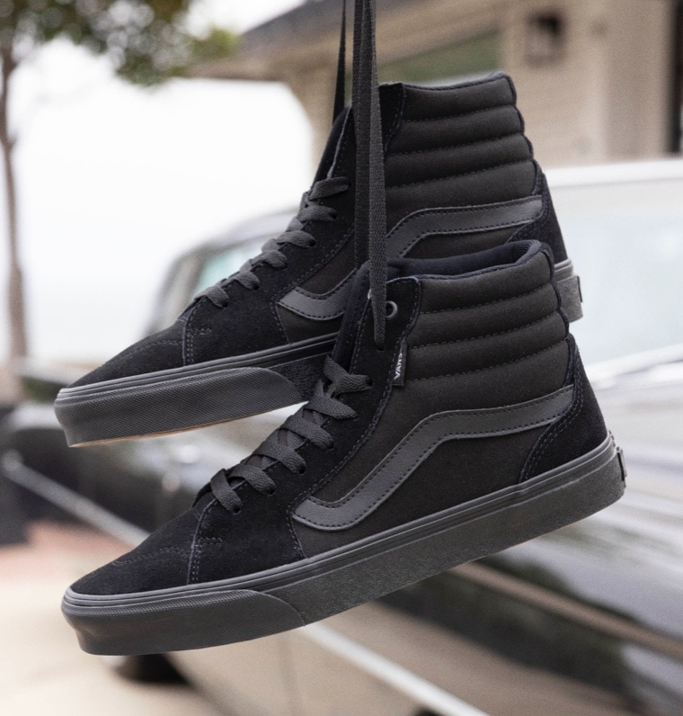 Vans black high top sneakers