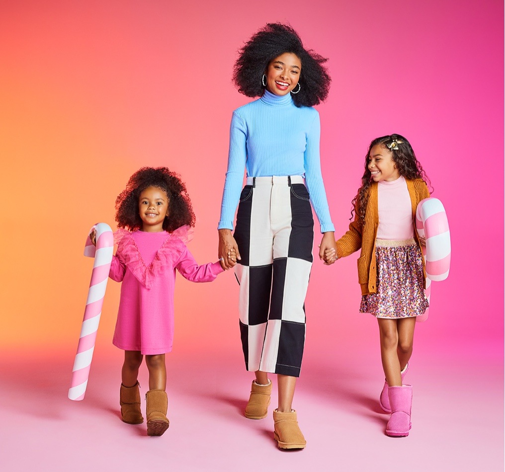 mom and daughters wearing cozy boots