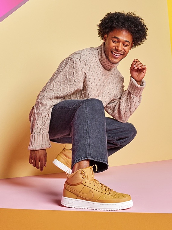 man wearing sand athletics sneakers