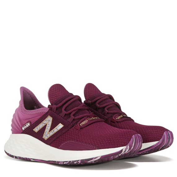 one pair of burgundy running shoes by New Balance