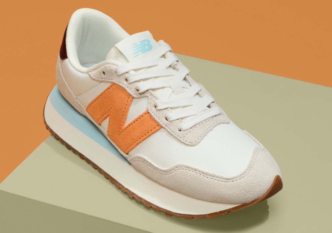 cream, gray, orange and light blue new blance 237 sneakers