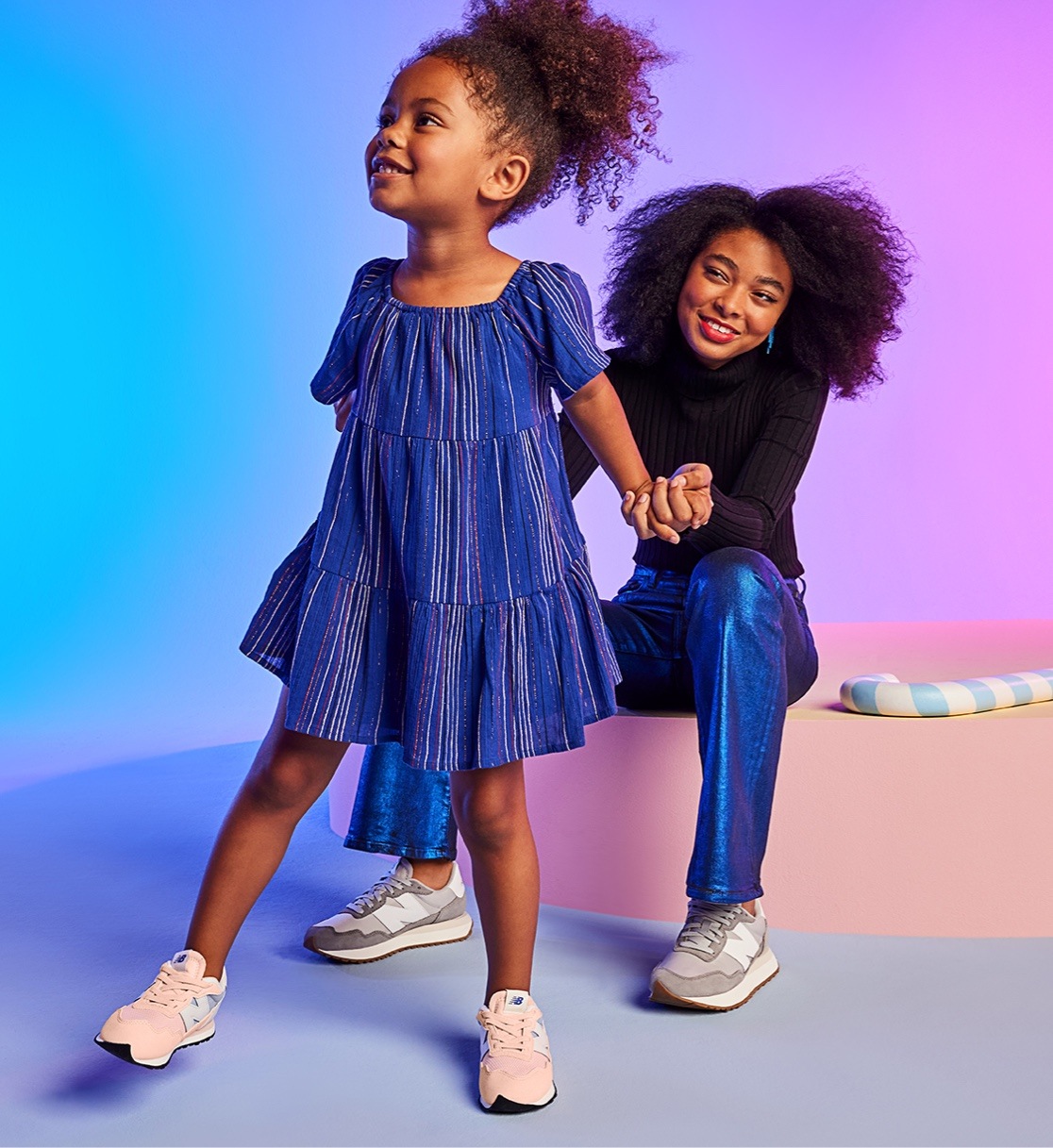 mother and daughter wearing retro sneakers