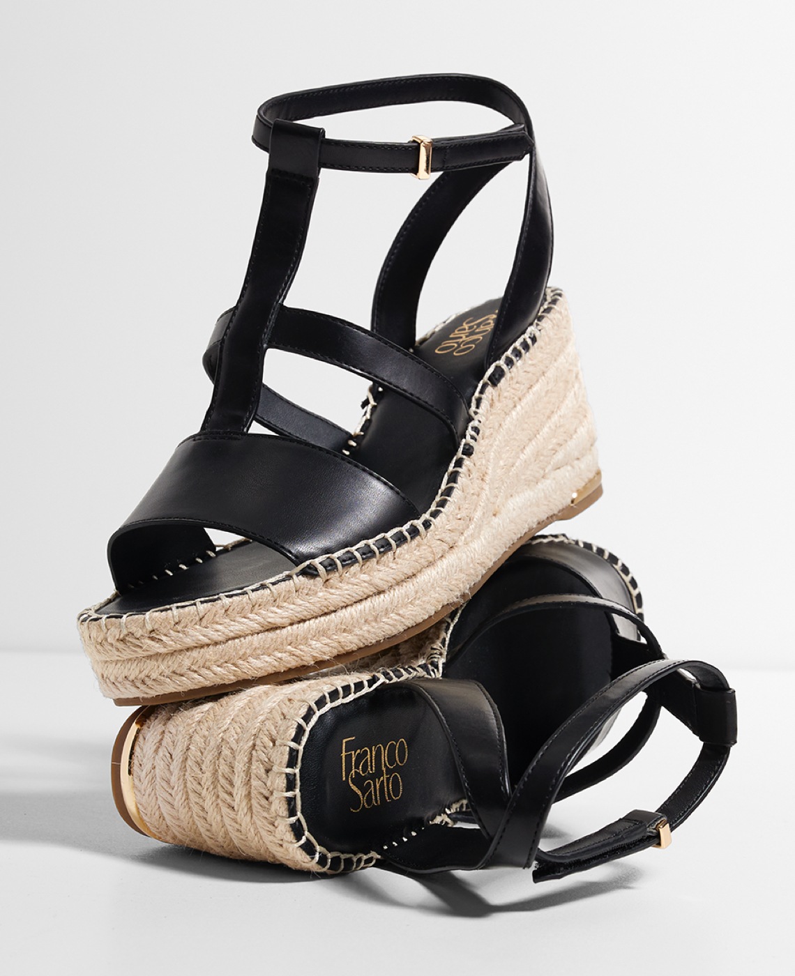 pair of black wedge sandals