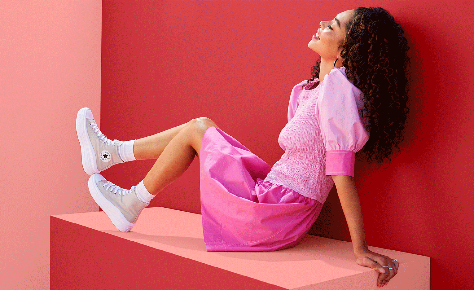 gif of different women wearing heels, wedges and tennis shoes