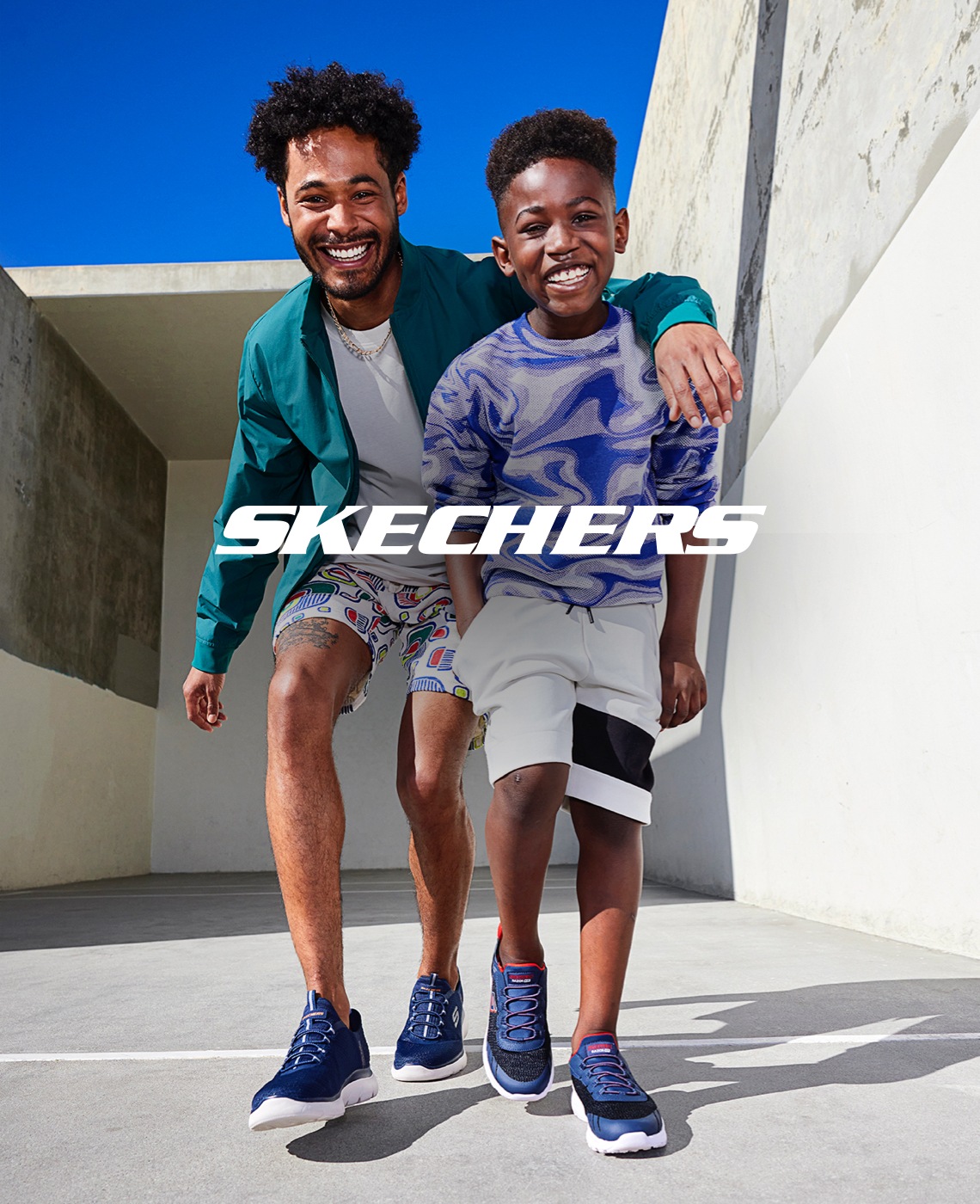 dad and son wearing skechers