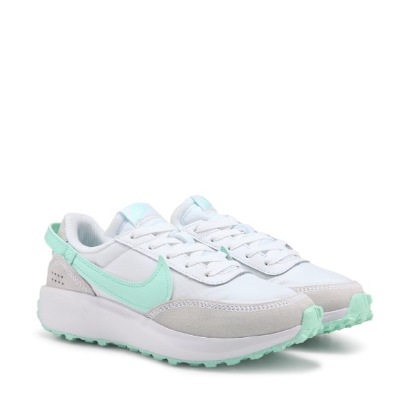 white and teal nike tennis shoes