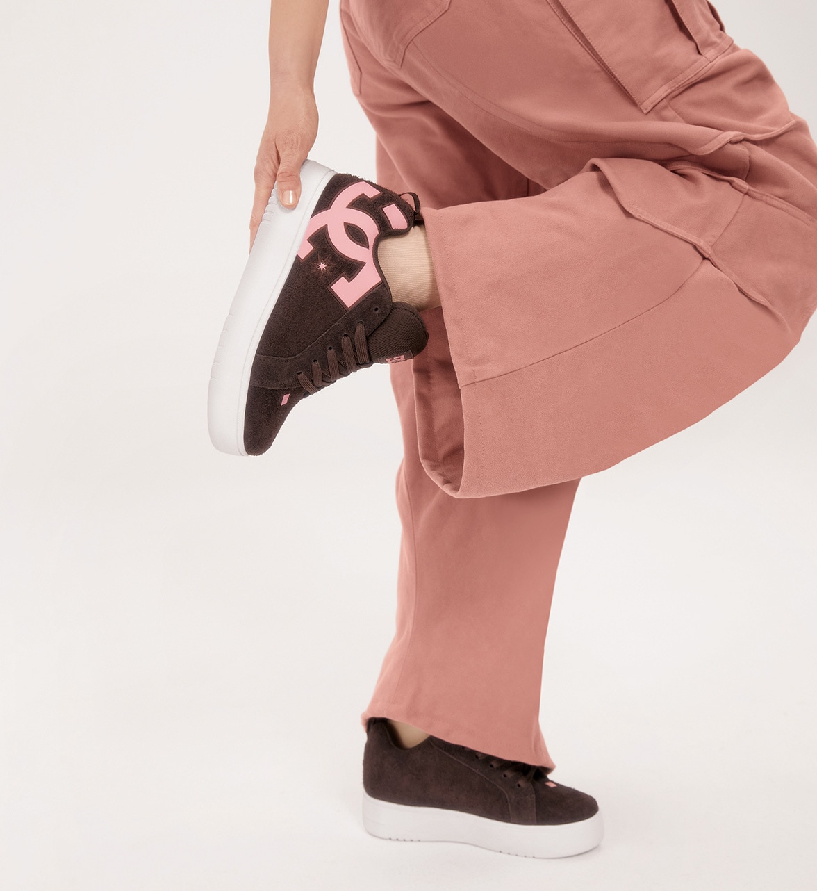 Woman wearing DC skate sneakers
