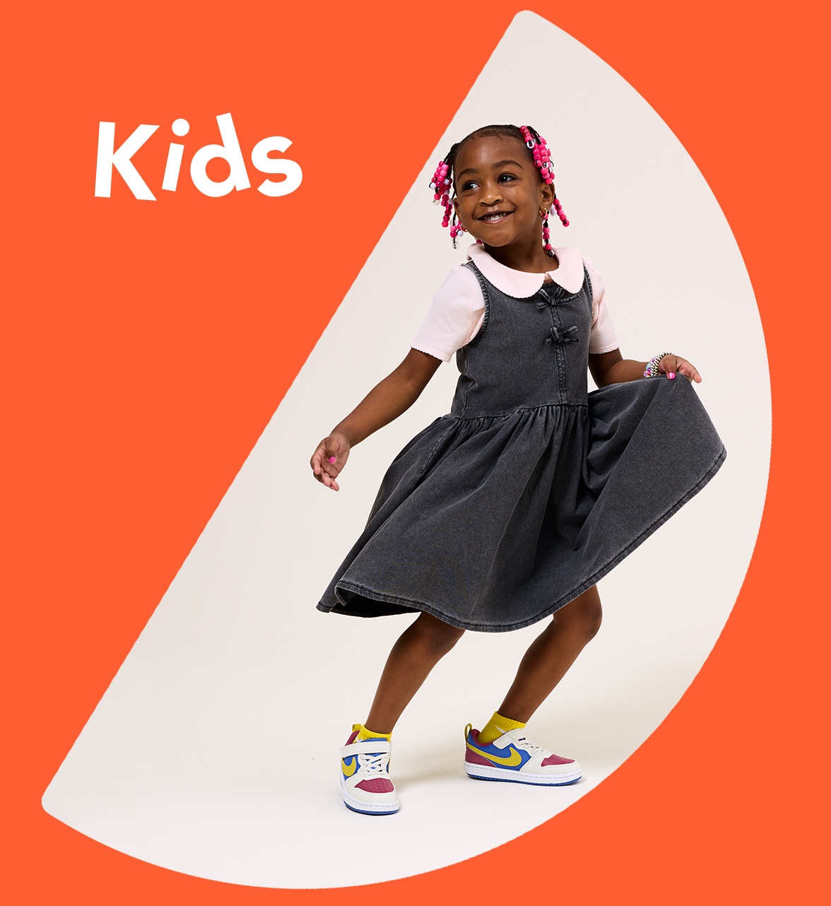 kid wearing NIKE court borough sneakers