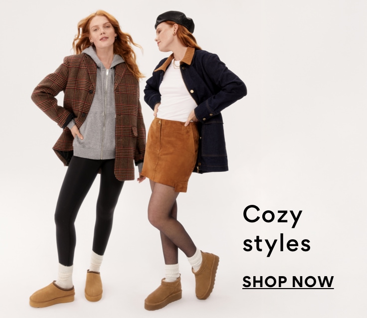 two woman wearing bearpaw cozy boots