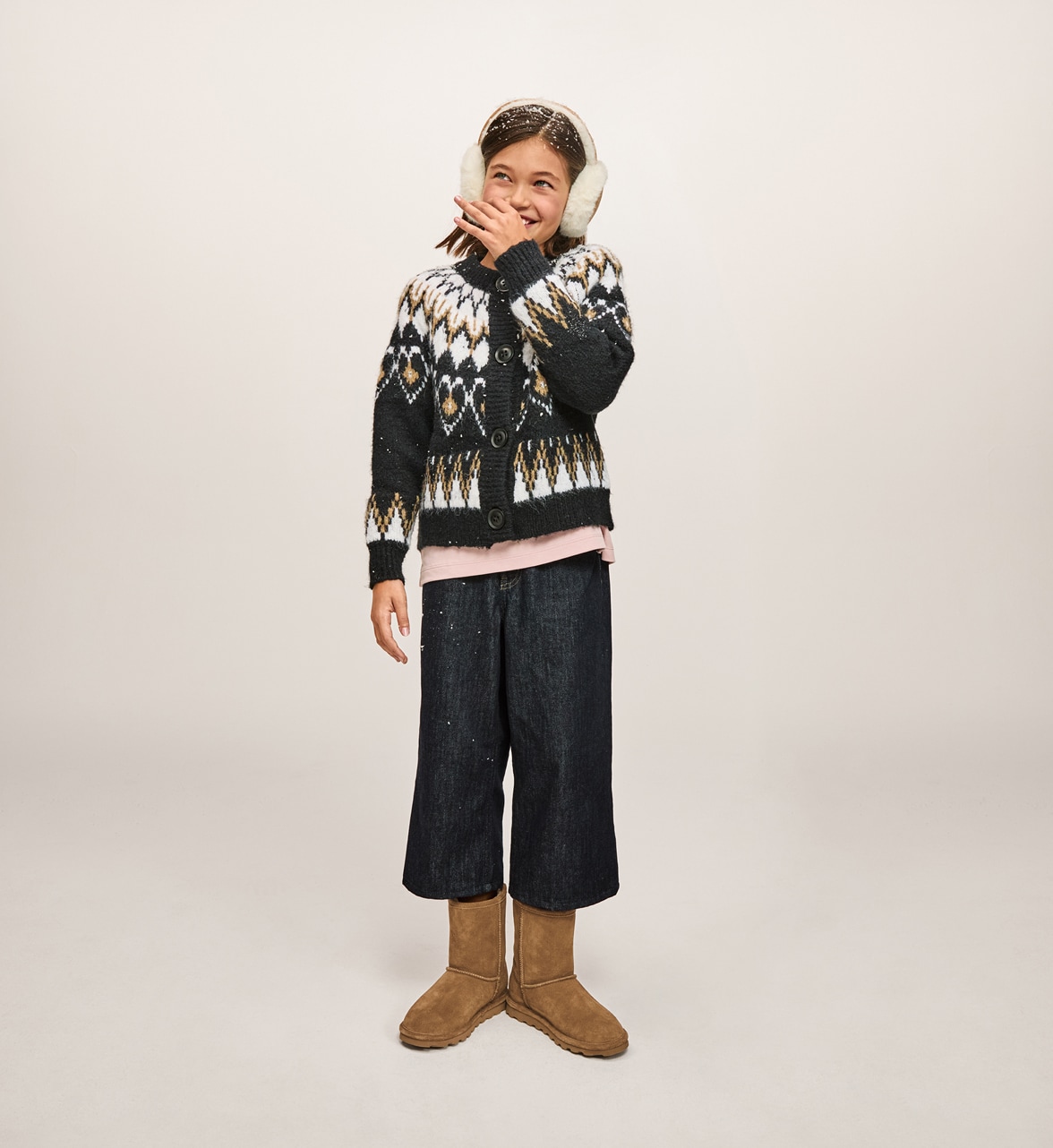 young girl wearing bearpaw boots