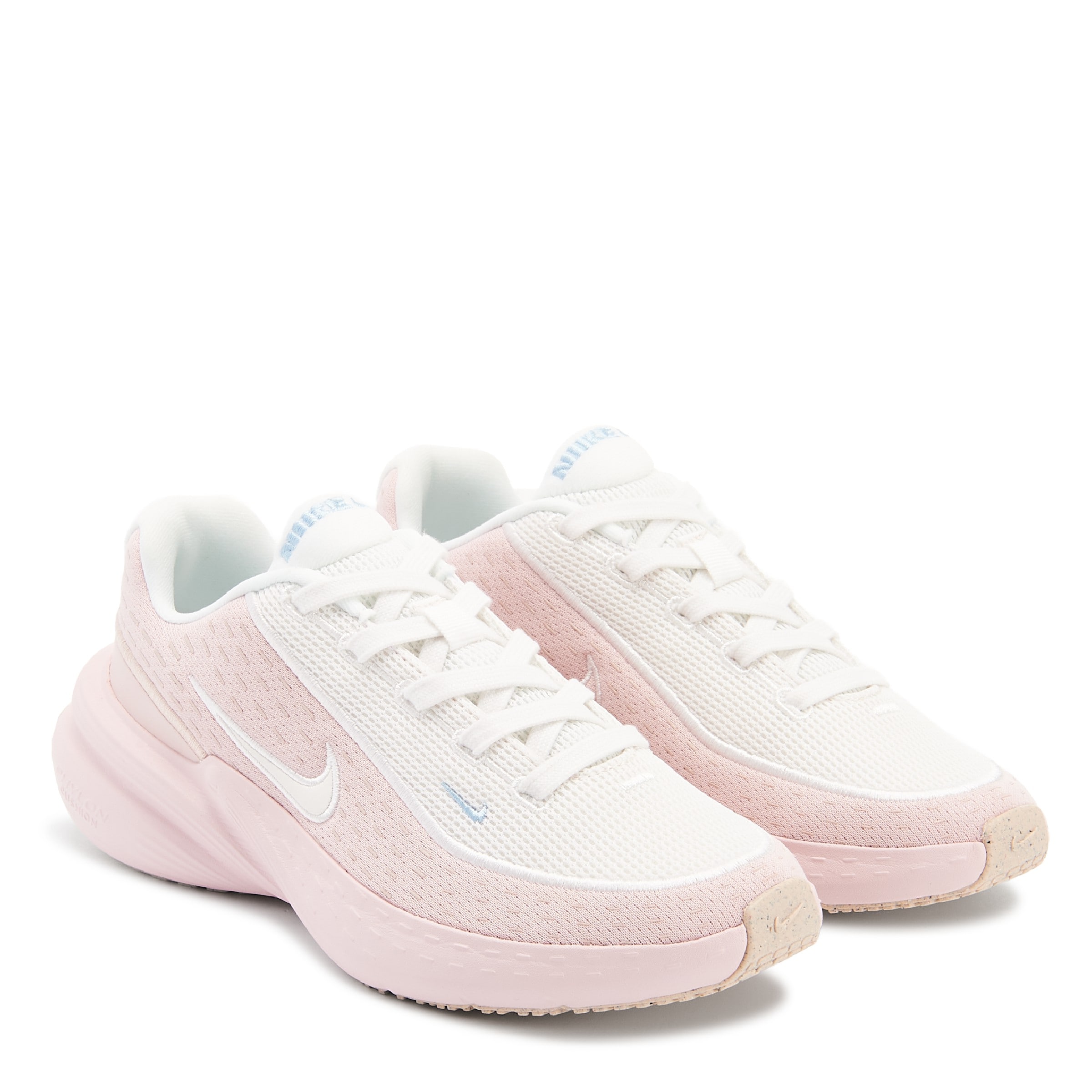 pink and white nike sneakers