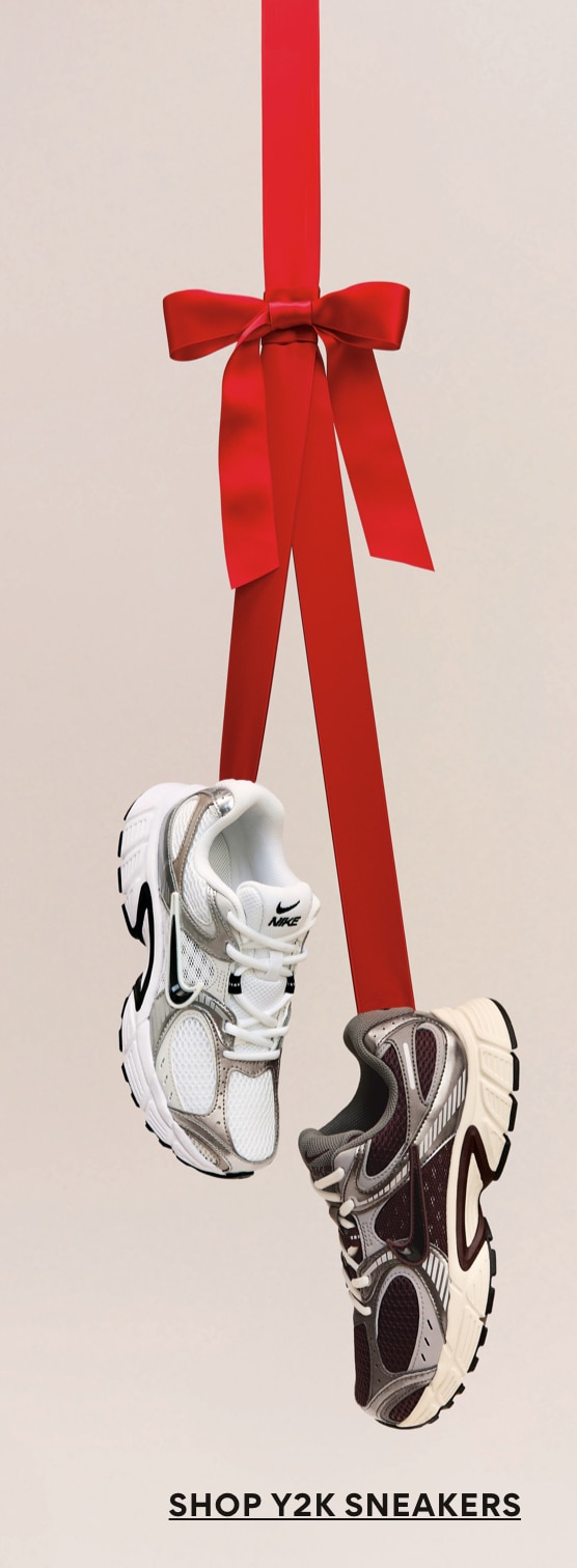 y2k sneakers hanging from a red bow