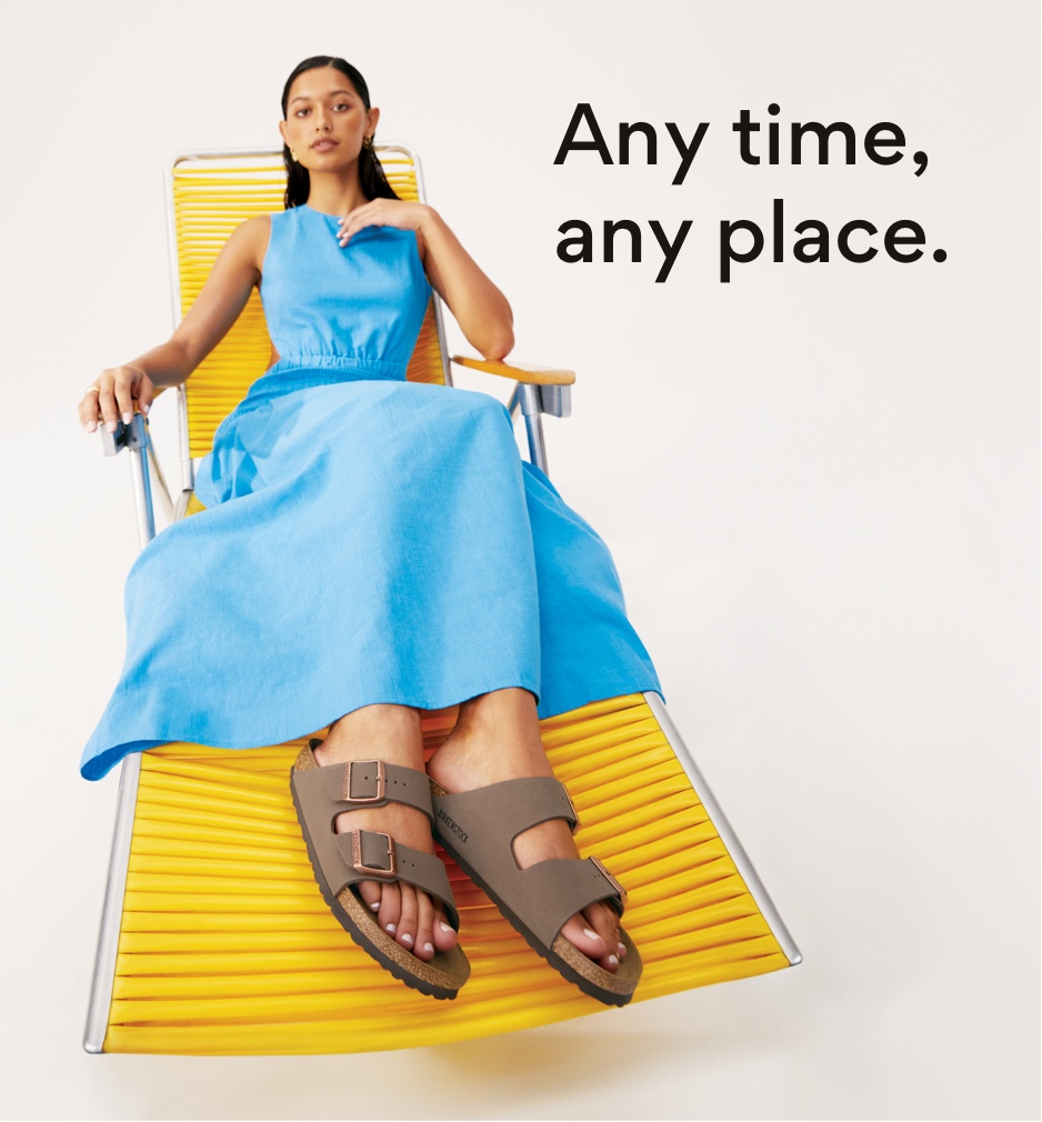 any time, any place. women sitting in lounge chair wearing birkenstock sandals