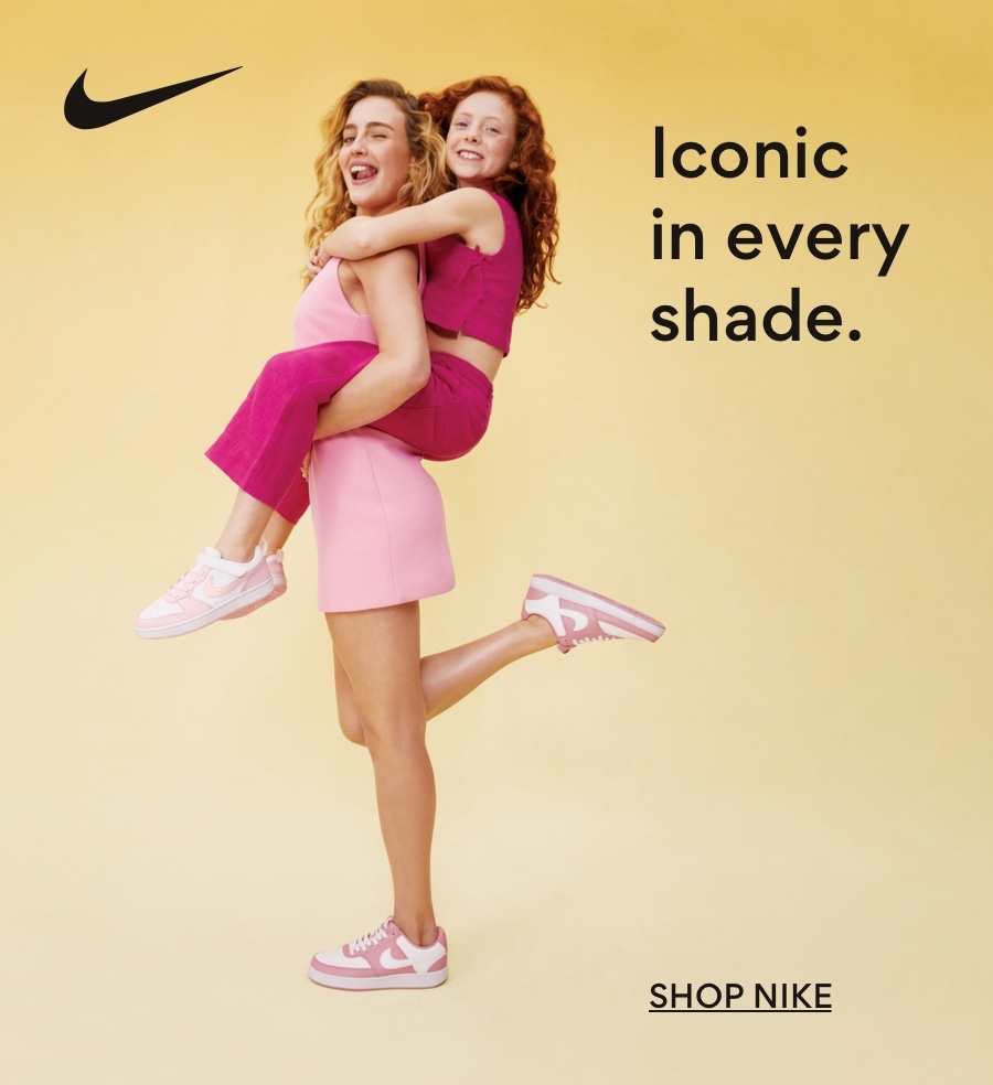 iconic in every shade. woman giving young girl piggy back ride and both wearing pink and white nike court sneakers. shop nike.