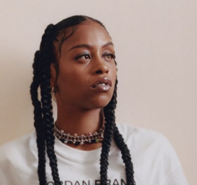 face of woman with braids