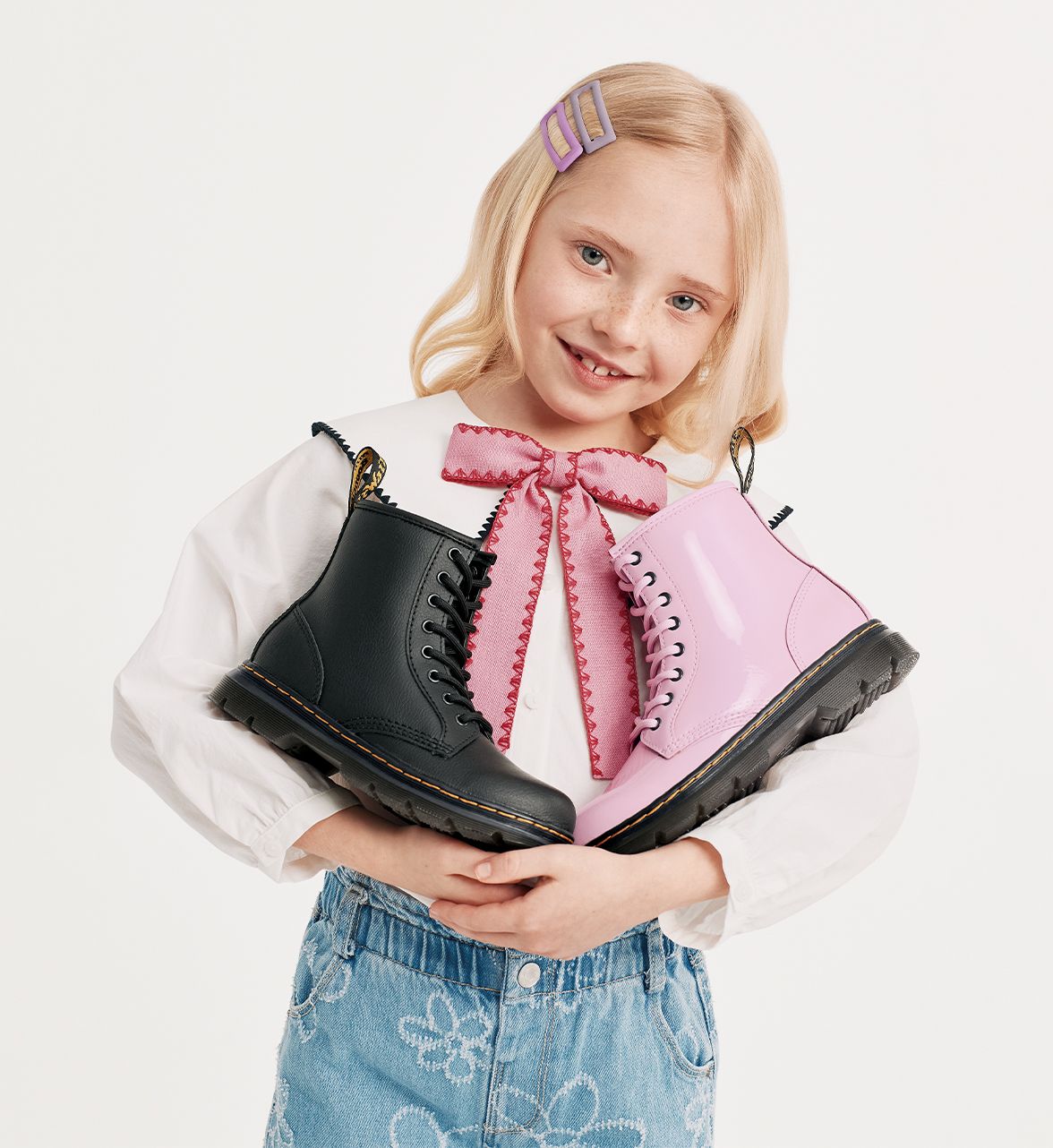 Dr. Martens boots in pink and black
