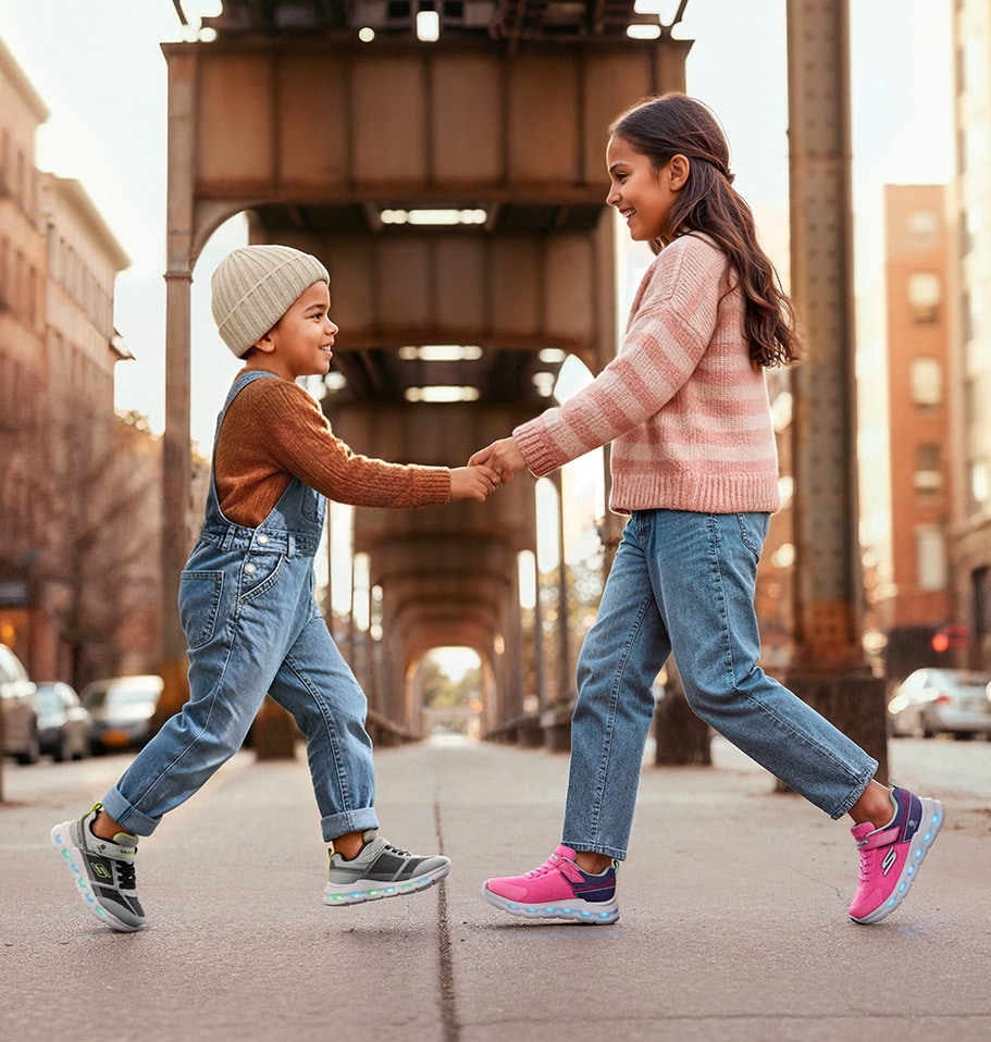 girl and boy wearing skechers