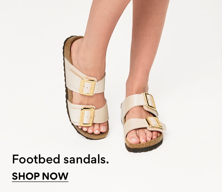 legs of person wearing platform converse