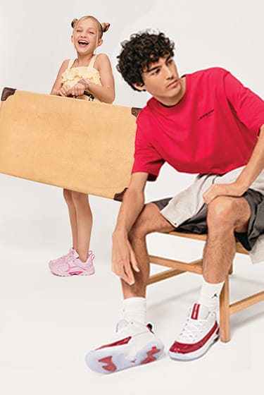 brother and sister wearing sneakers