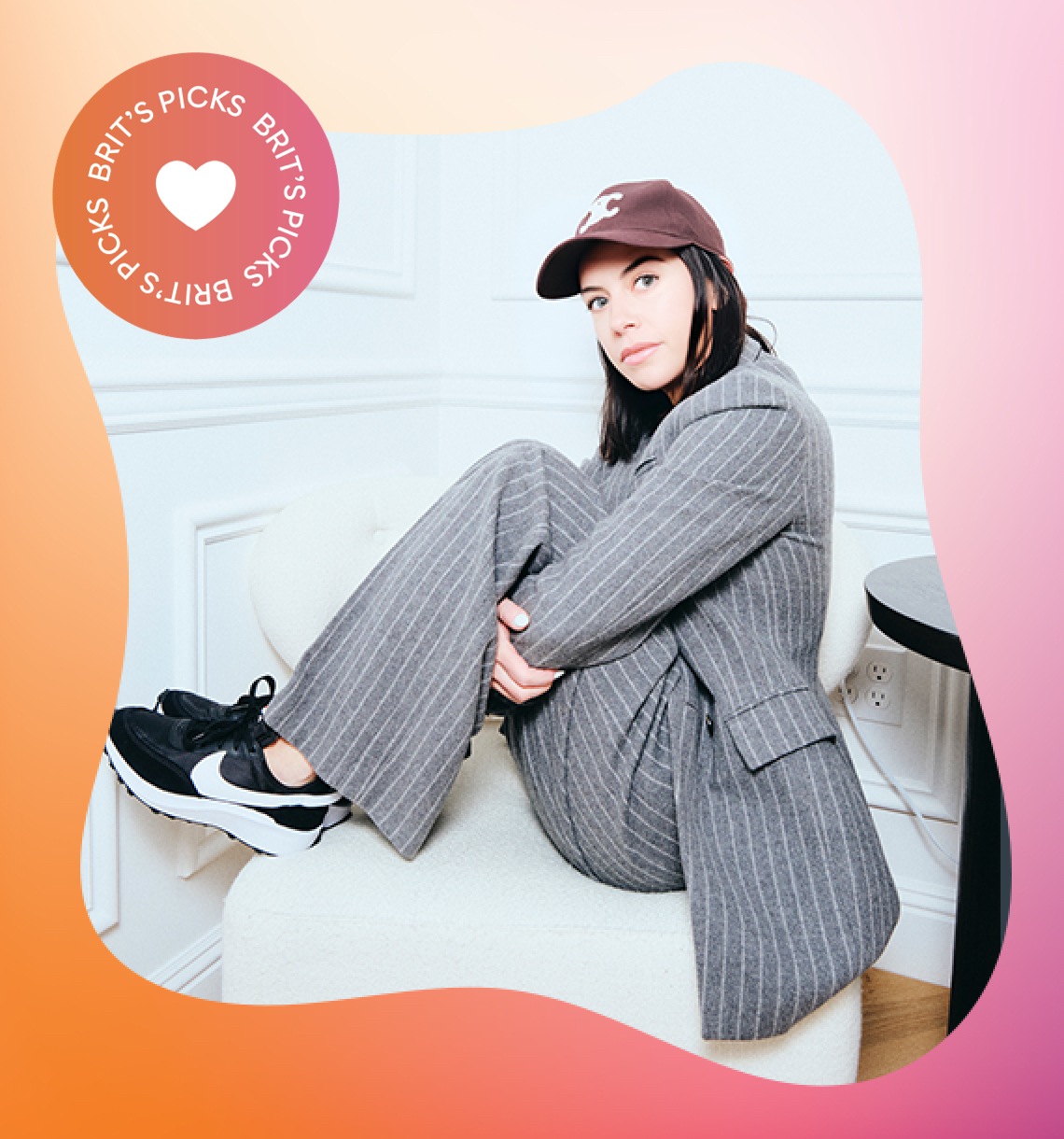 brit in grey suit wearing retro sneakers