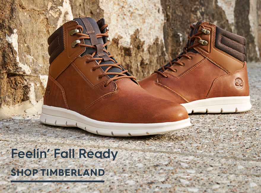 Men's Timberland sneaker boots on pavement