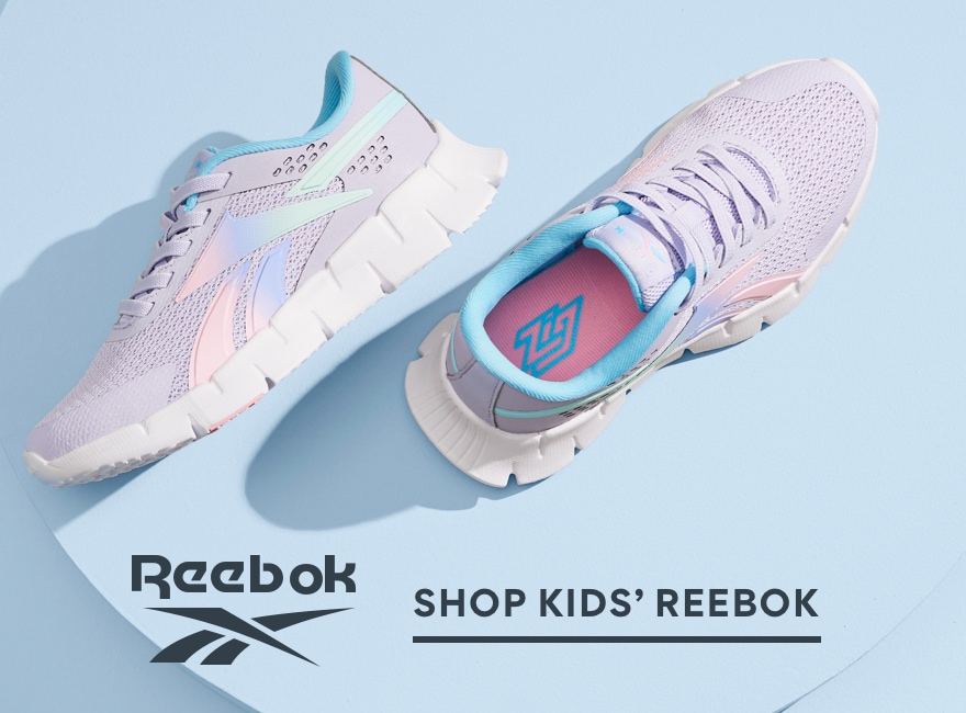 kids light purple and light blue reebok sneakers