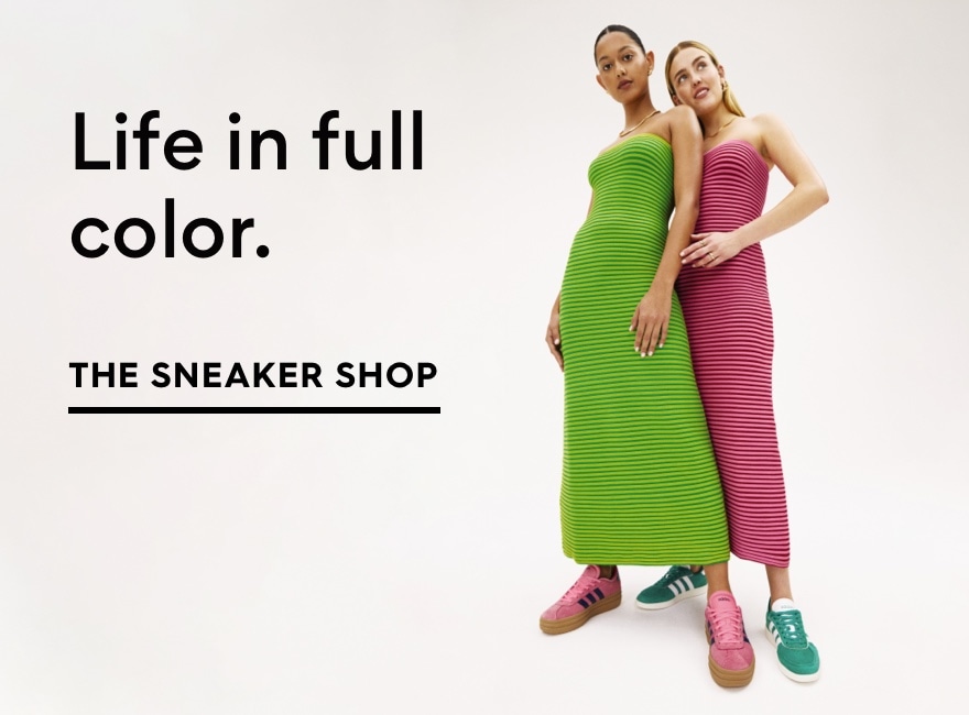 Two women wearing adidas sneakers. Shop the Sneaker Shop 