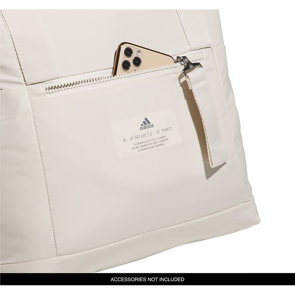 the brand with the three stripes bag