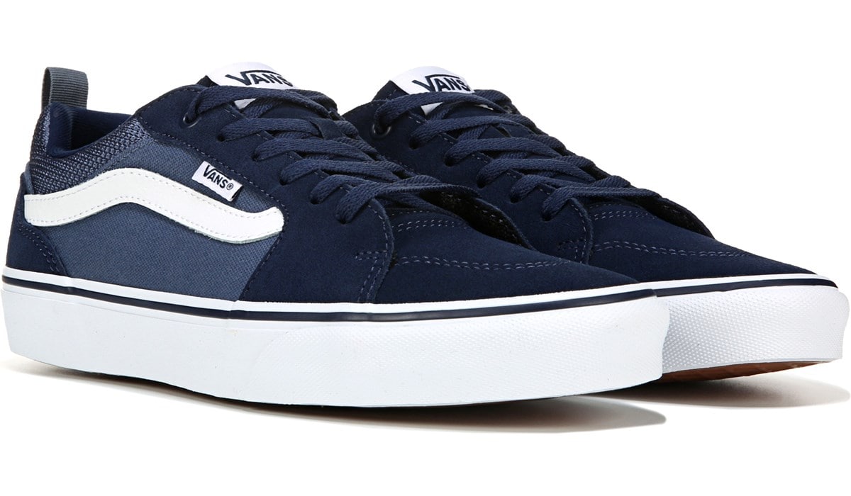 famous footwear black slip on vans