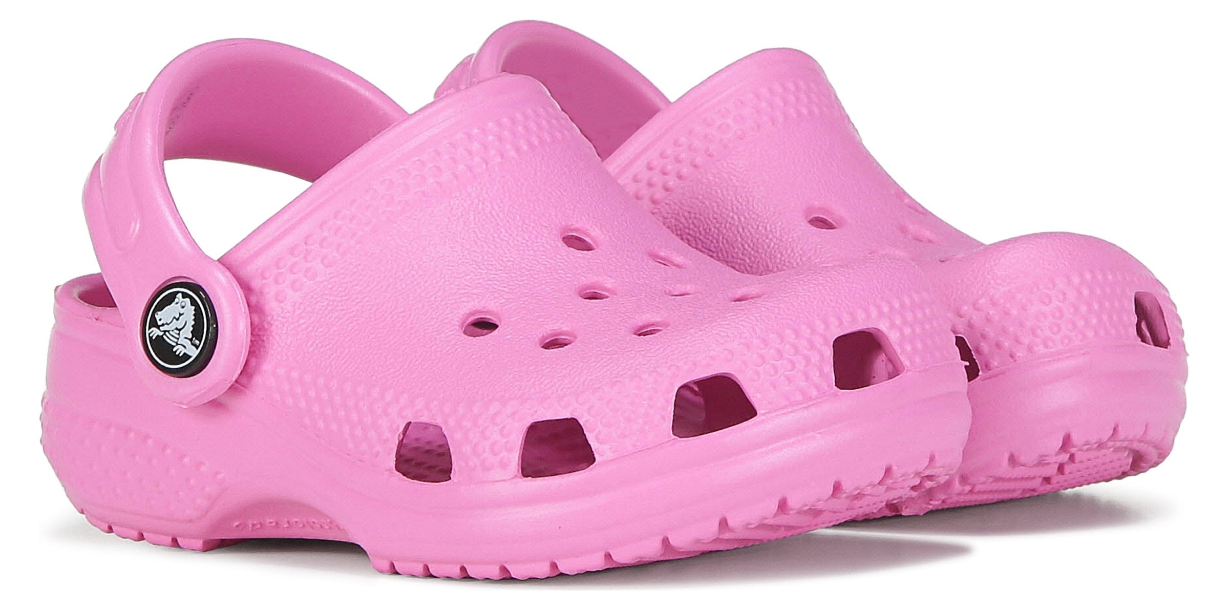 pink crocs with