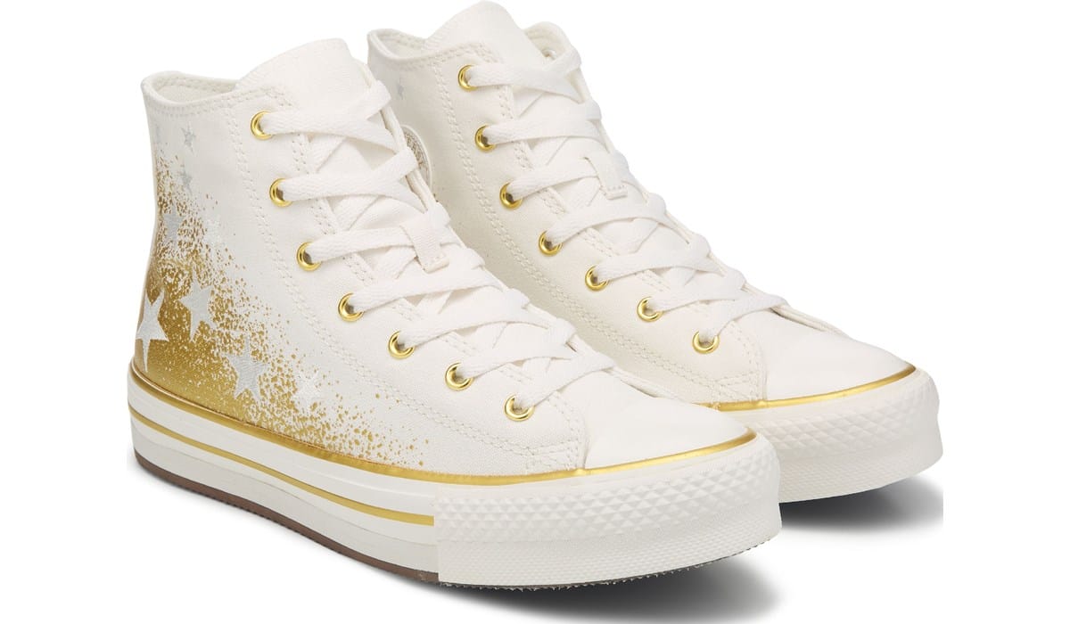 white and gold leather converse