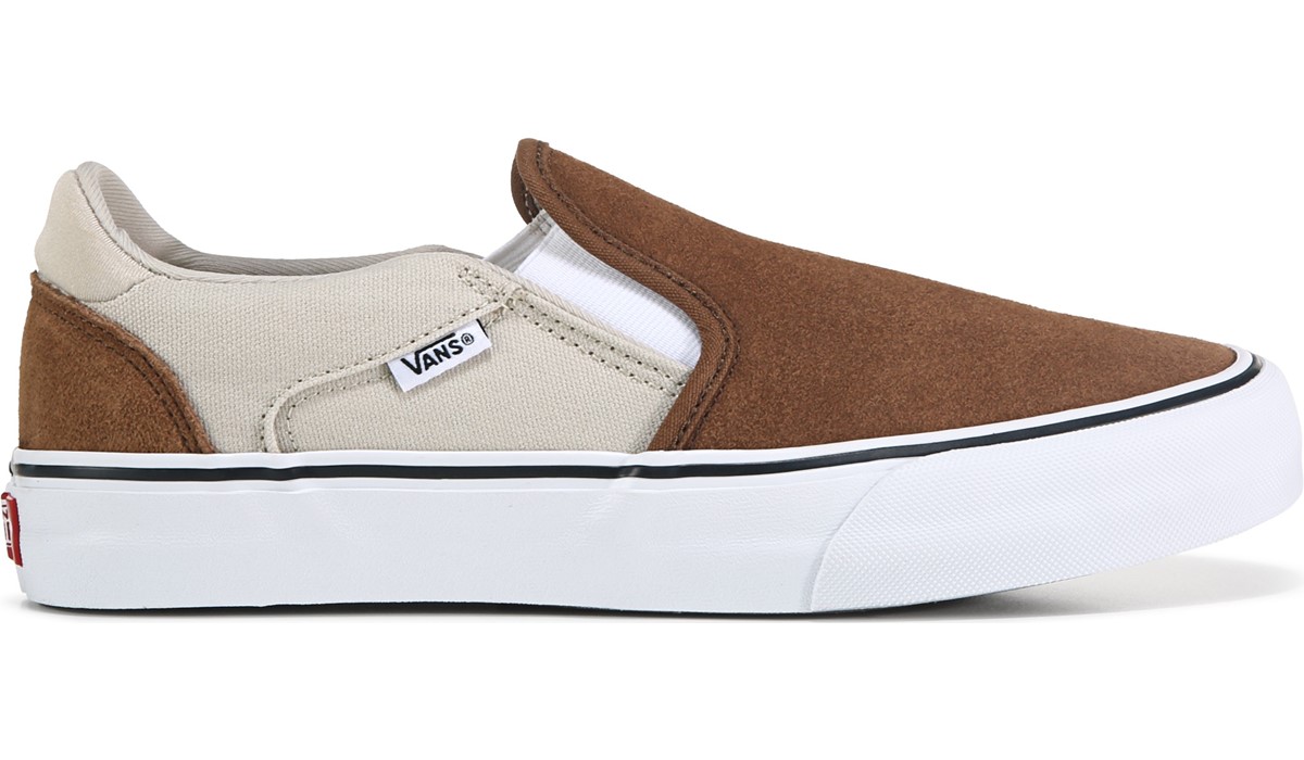 Famous footwear white slip on vans 2025