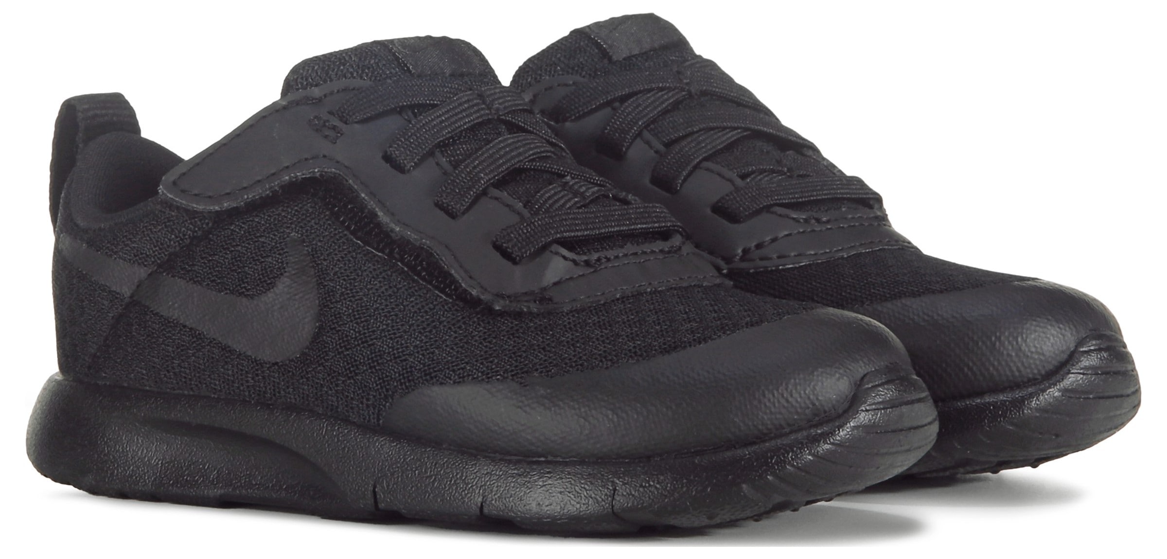 Famous footwear deals nike tanjun women's
