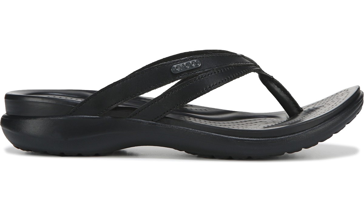black strappy flip flops