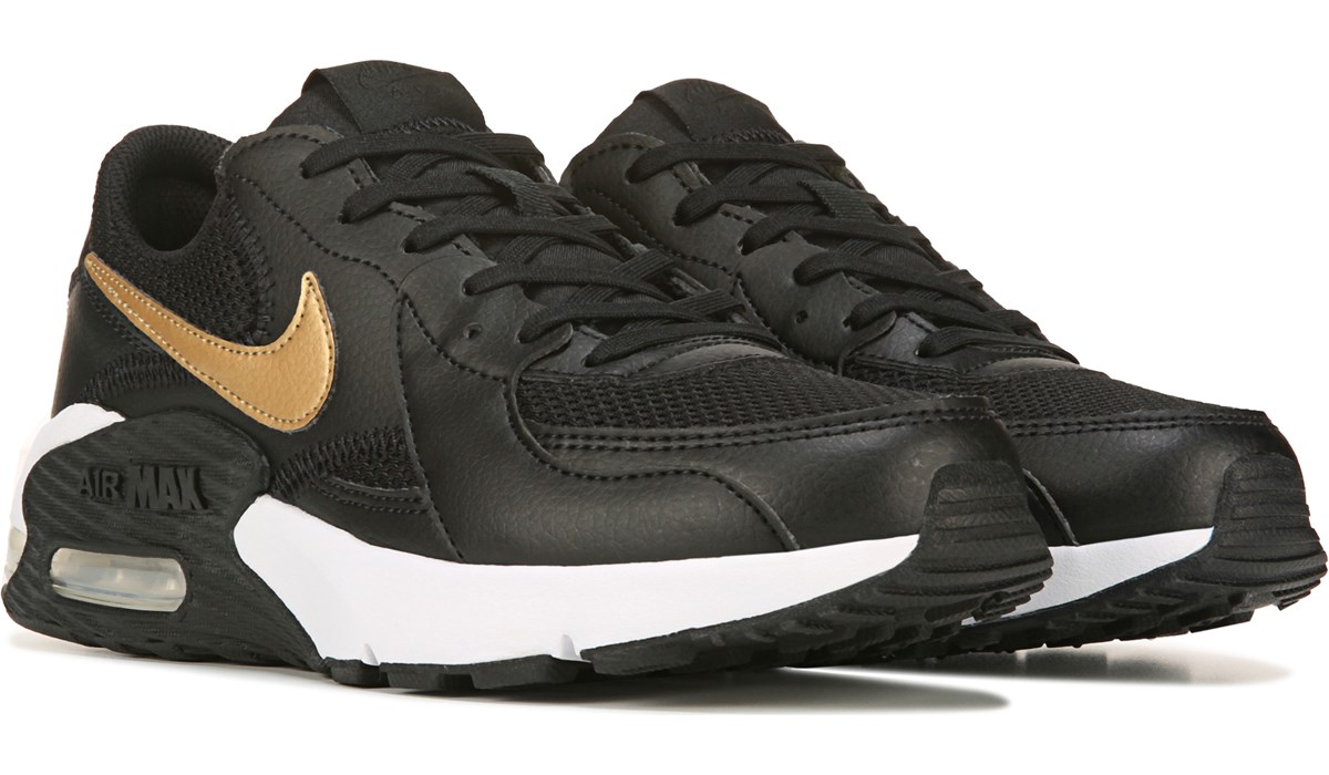 black and gold athletic shoes