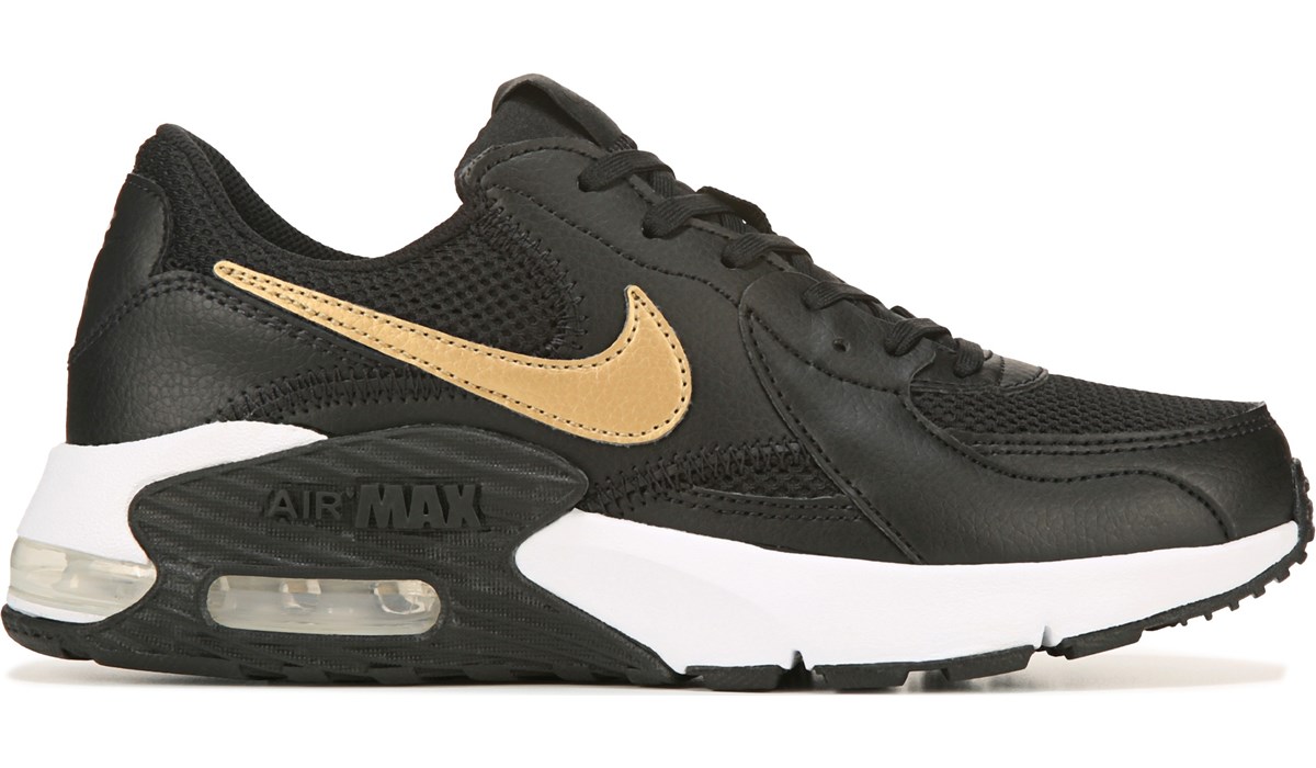 gold and black nike