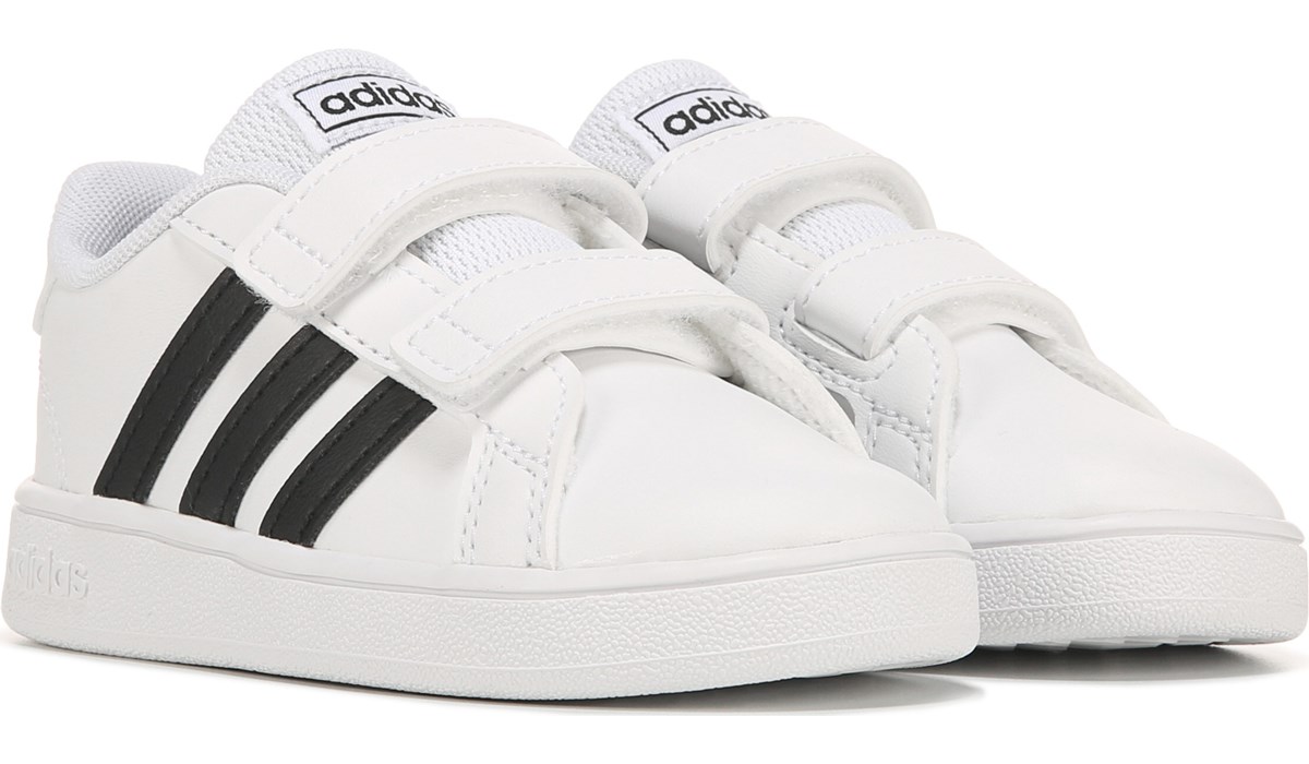 famous footwear white adidas